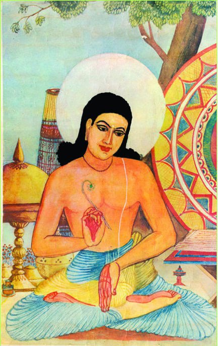 A painted portrait of Srimanta Sankardev seated cross-legged beneath a tree, a white halo behind his head, the sacred thread across his chest, holding a lotus, with a brass sarai offering stand and a painted wheel motif beside him